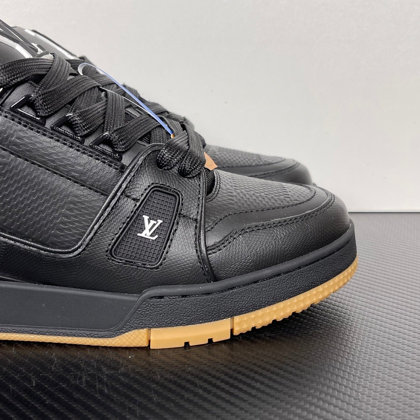 Trainer Black and Brown Sole